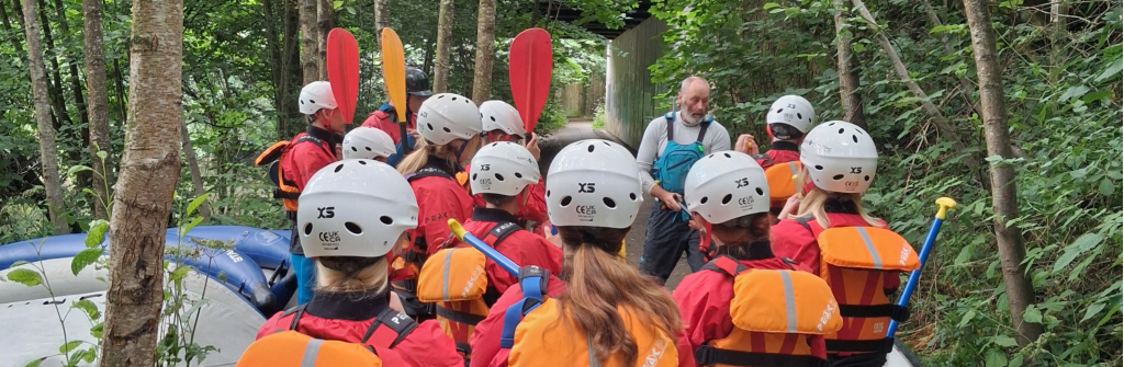 Foster children enjoying a river activity with Team Fostering